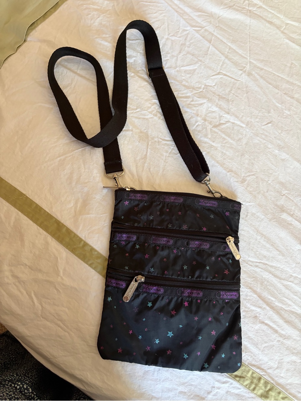 LESPORTSAC Crossbody with glitter stars, amazing worn condition, black and zips